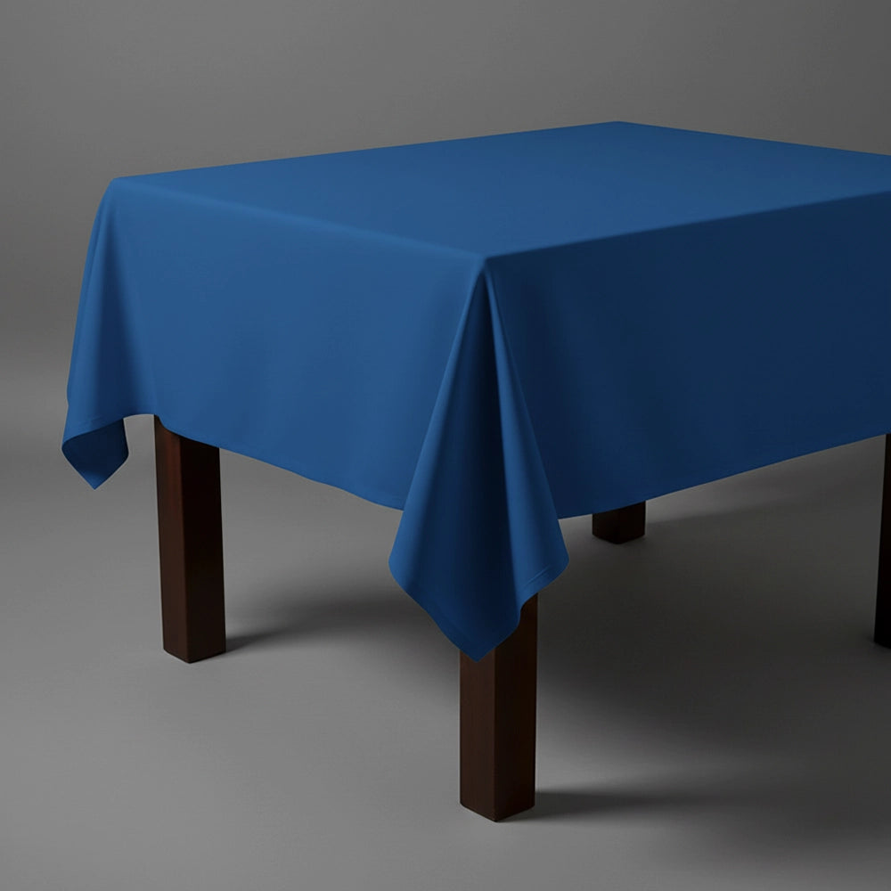 Royal blue square table cloth on wooden table by Linen and Co - premium hospitality table linen
