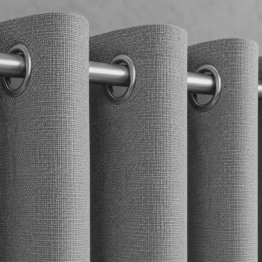Close-up of Celeste Greystone blockout eyelet curtain fabric by Silk House for Linen & Co