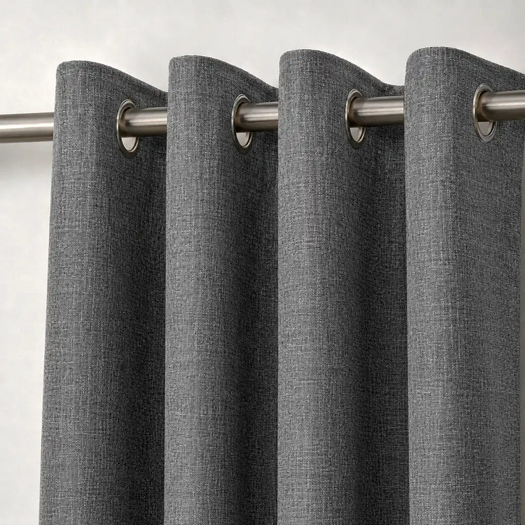 Close-up of Celeste Smoke blockout eyelet curtain fabric by Silk House for Linen & Co