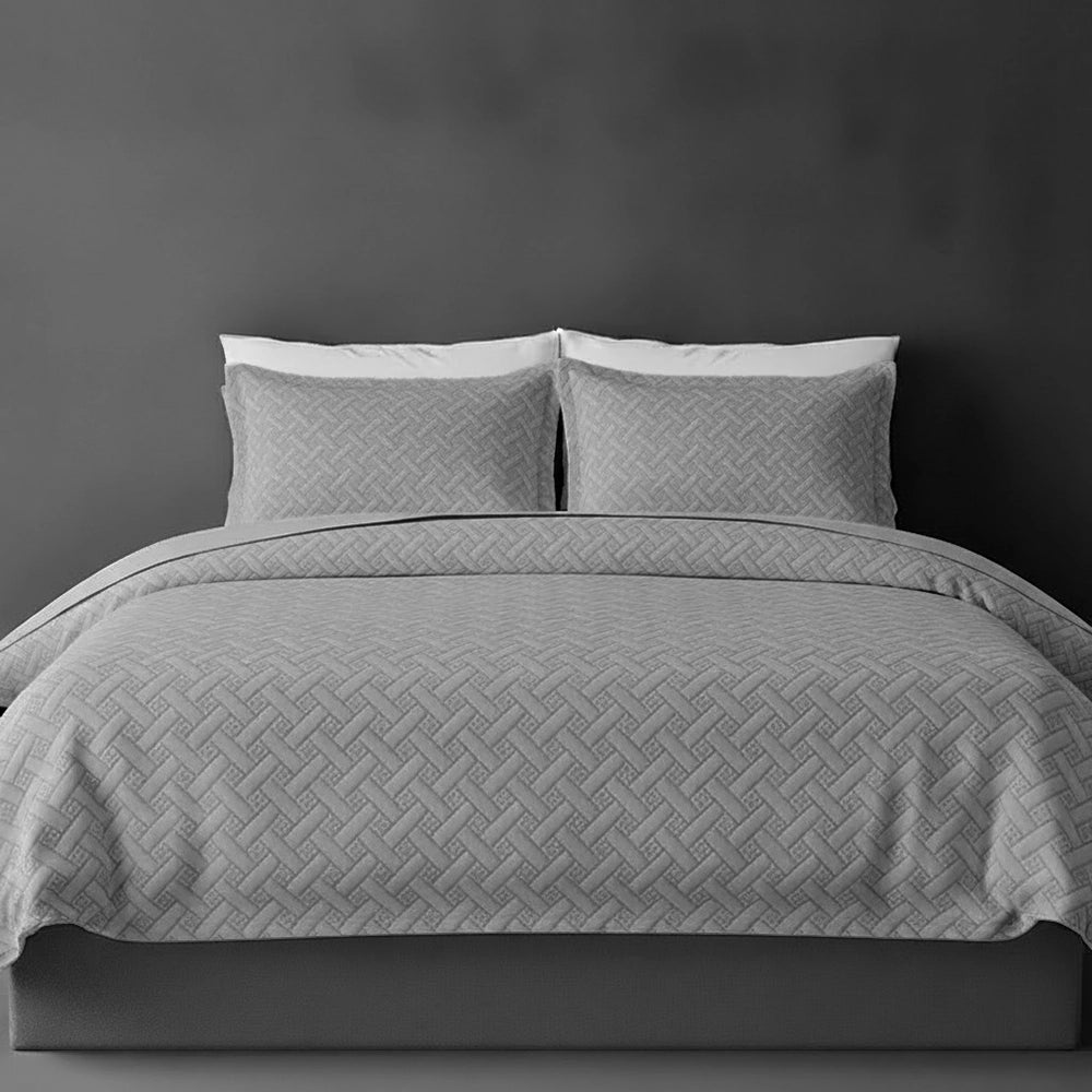 Silver Grey Italian Velvet bedspread on bed by Linen and Co - luxury hospitality bedspread with textured 