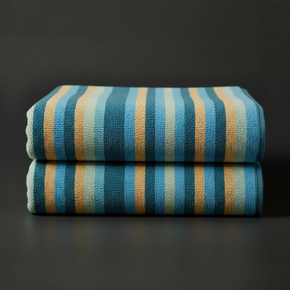 Blue, Cream Multicolour Velour striped beach towels stacked - premium hospitality pool linen by Linen and Co