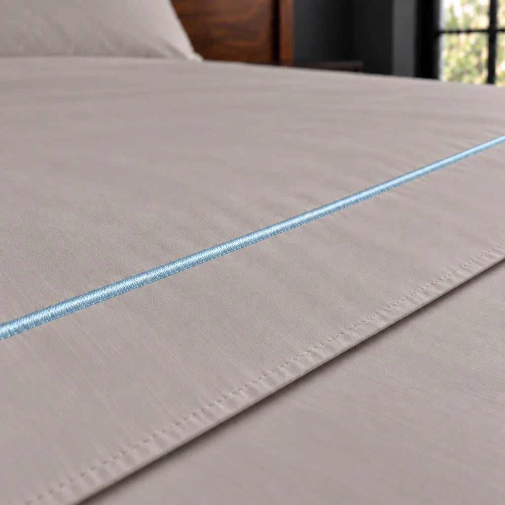 stone cotton percale 200tc flat sheet, one row duck egg satin stitch — close up — Linen and Co