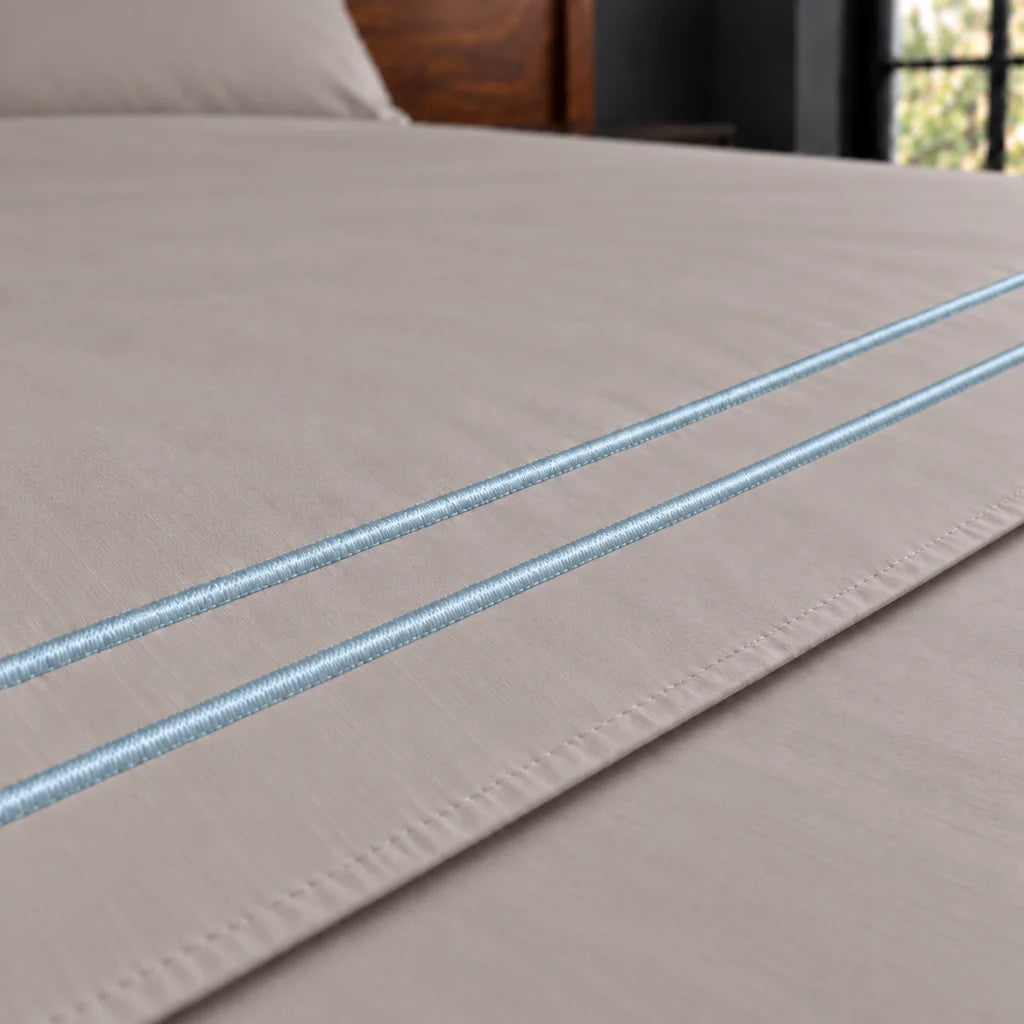 stone cotton percale 200tc flat sheet, two row duck egg satin stitch — close up — Linen and Co