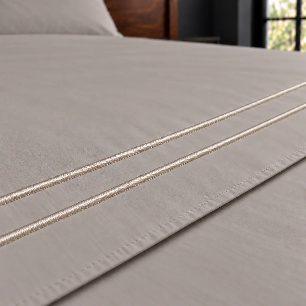 stone cotton percale 200tc flat sheet, two row stone satin stitch — close up — Linen and Co