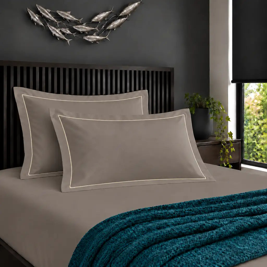 Oxford stone 200TC cotton percale pillowcases with one row cream satin stitch border by Linen and Co