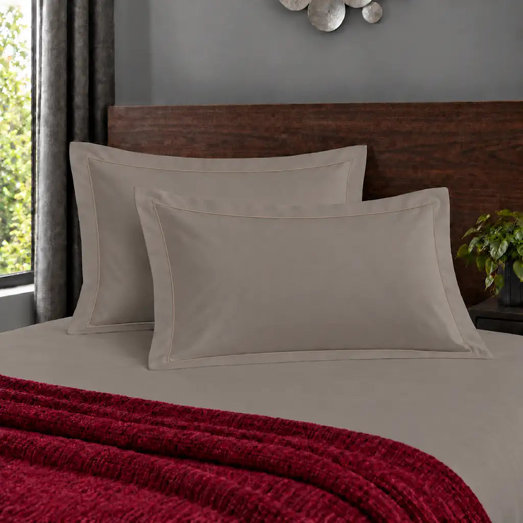 Oxford stone 200TC polycotton percale pillowcases with one row stone satin stitch border by Linen and Co
