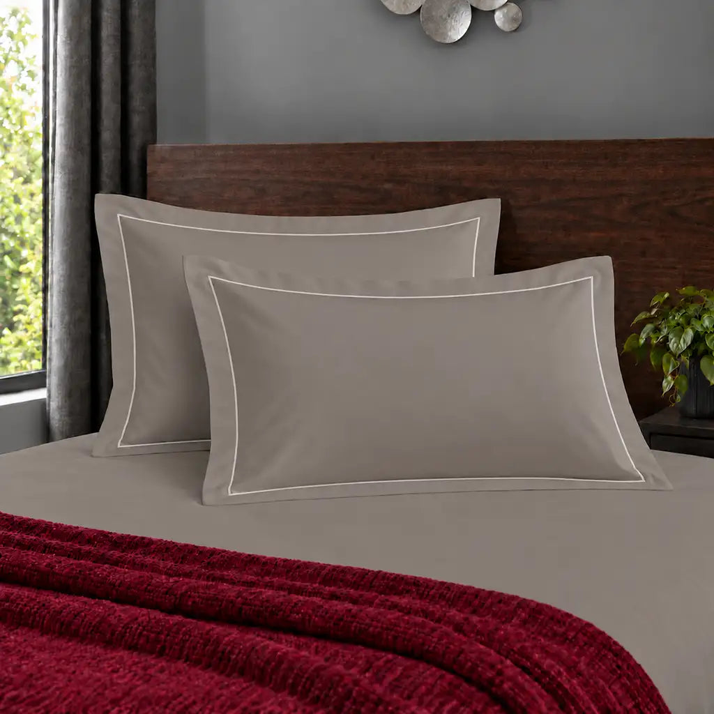 Oxford stone 200TC polycotton percale pillowcases with one row white satin stitch border by Linen and Co