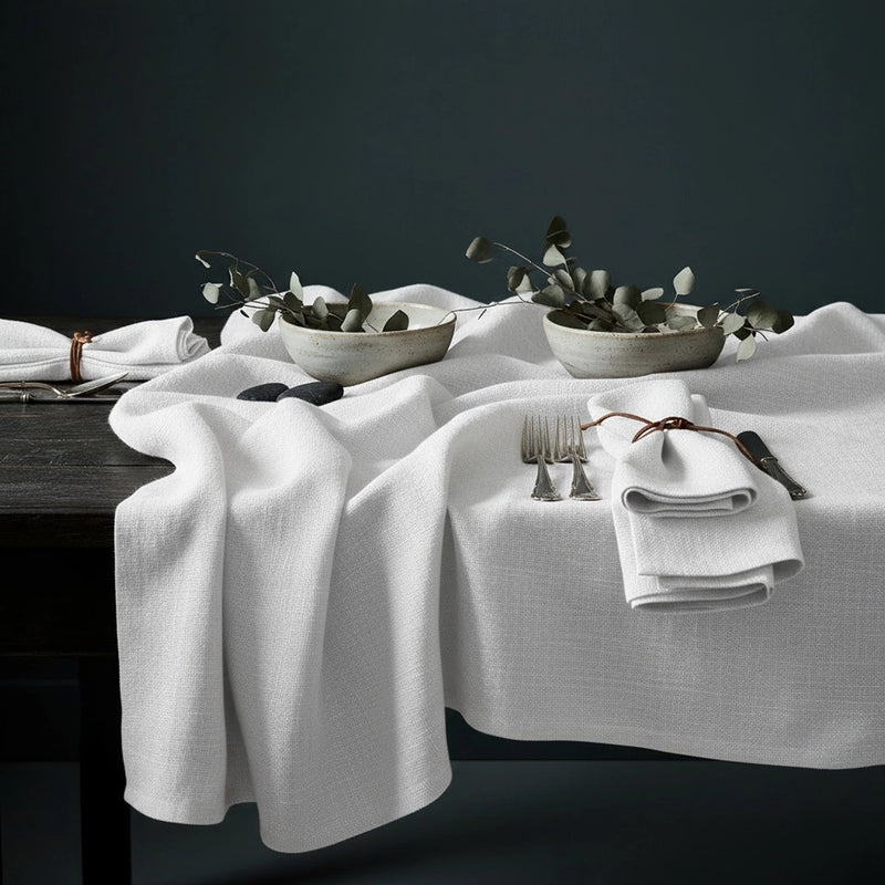 Luxury white table linen by Linen and Co - customisable napkins, tablecloths and overlays for hospitality