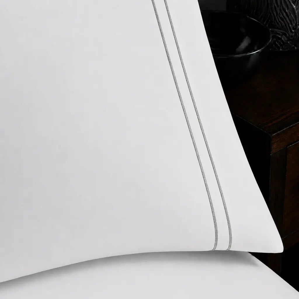 Close-up of White 100% Cotton Percale 200TC pillow case with Grey two-row satin stitch - Linen and Co