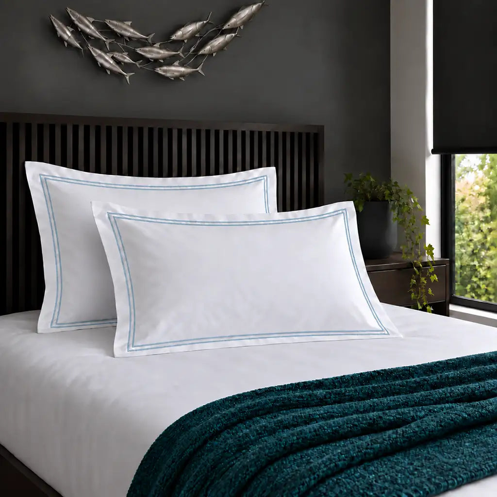 Oxford white 200TC 100% cotton percale pillowcases with two row duck egg satin stitch border by Linen and Co