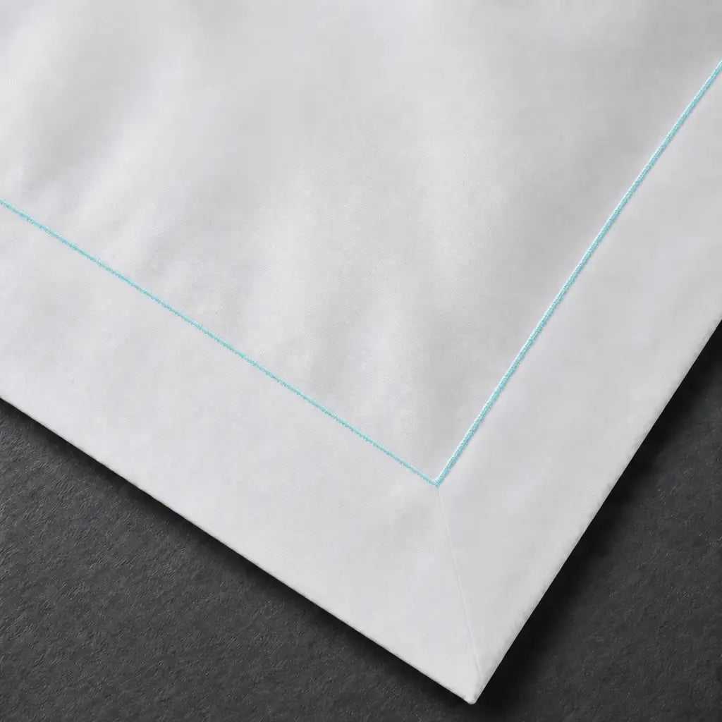 White Cotton 300TC Oxford duvet cover set with one row duck egg satin stitch — embroidery close-up — Linen & Co