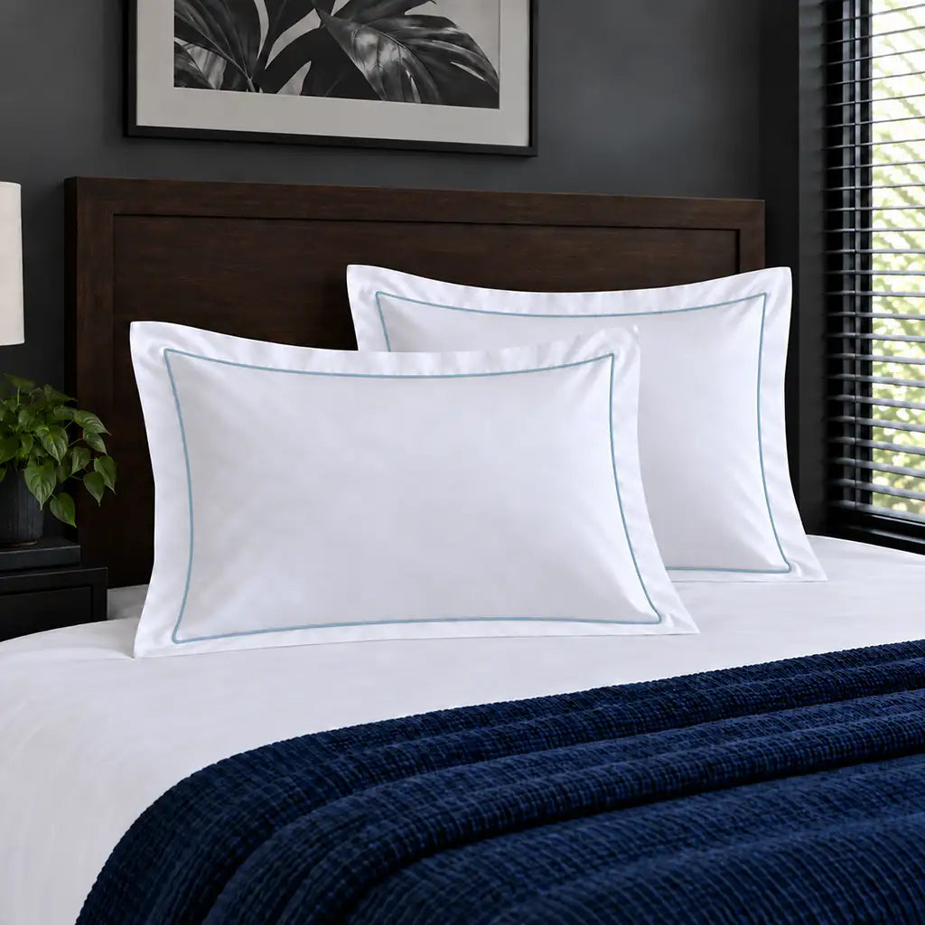 Oxford white 300TC 100% cotton percale pillowcases with one row duck egg satin stitch border by Linen and Co