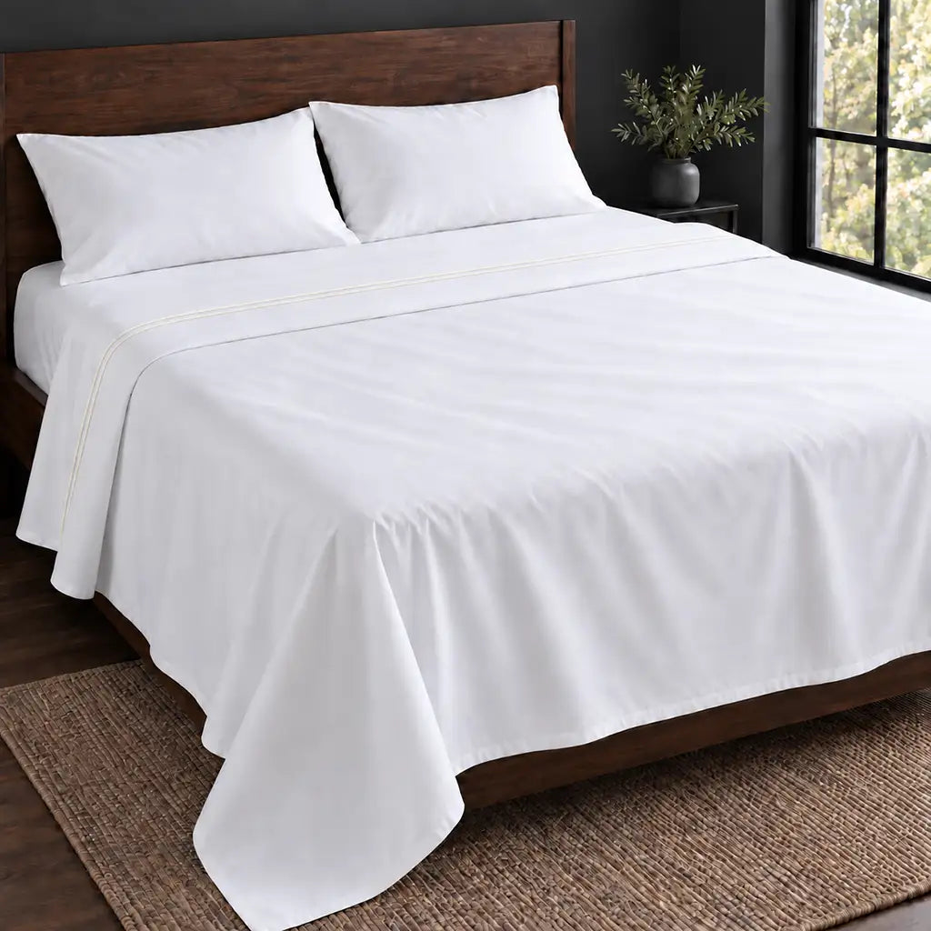 white polycotton percale 200tc flat sheet, two row cream satin stitch — hero — Linen and Co