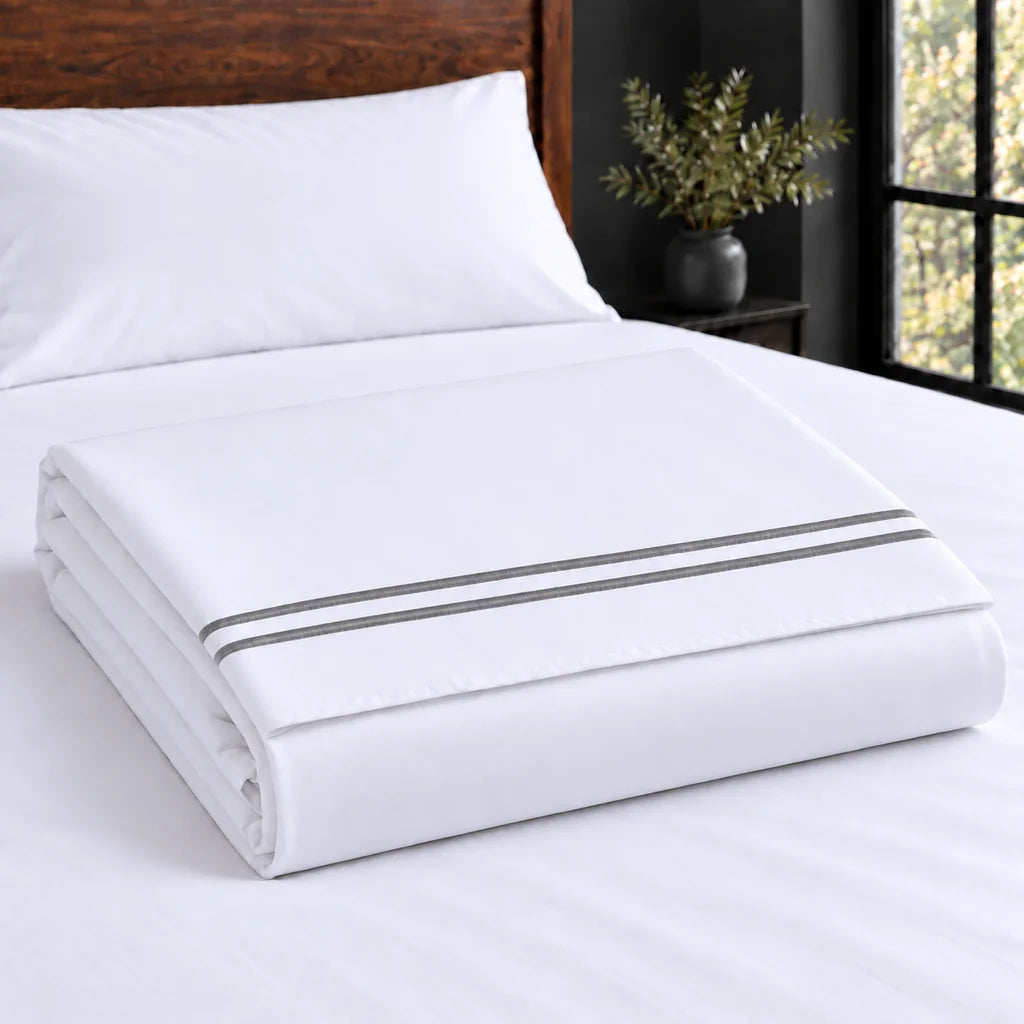 white polycotton percale 200tc flat sheet, two row grey satin stitch — construction — Linen and Co