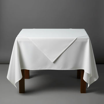 White overlay on a white table cloth by Linen and Co - premium hospitality 